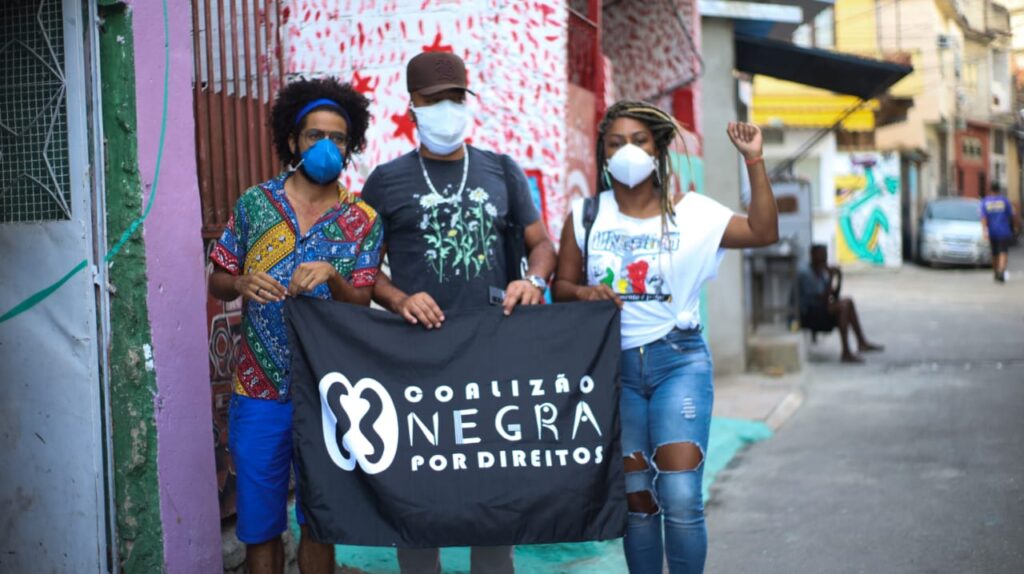 Créditos: Os ativistas Wesley Teixeira (esquerda), Douglas Belchior (meio) e Vanessa Vicente (direita