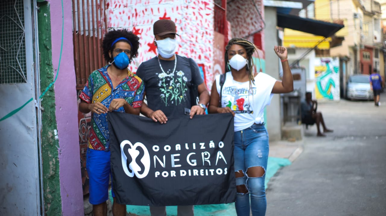 Créditos: Os ativistas Wesley Teixeira (esquerda), Douglas Belchior (meio) e Vanessa Vicente (direita